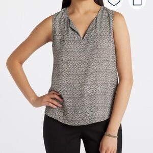 Elegant Black and White Sleeveless Blouse